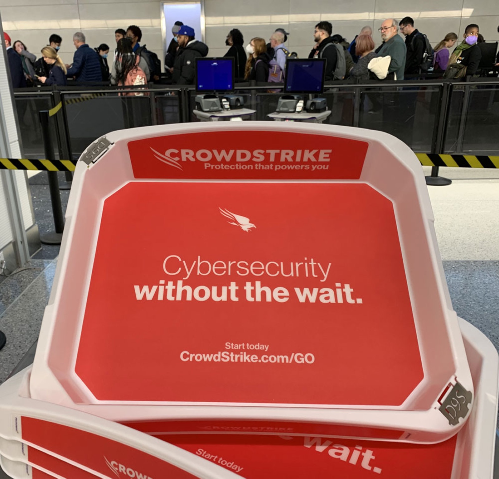 Branded advertising insert inside an airport security screening tray